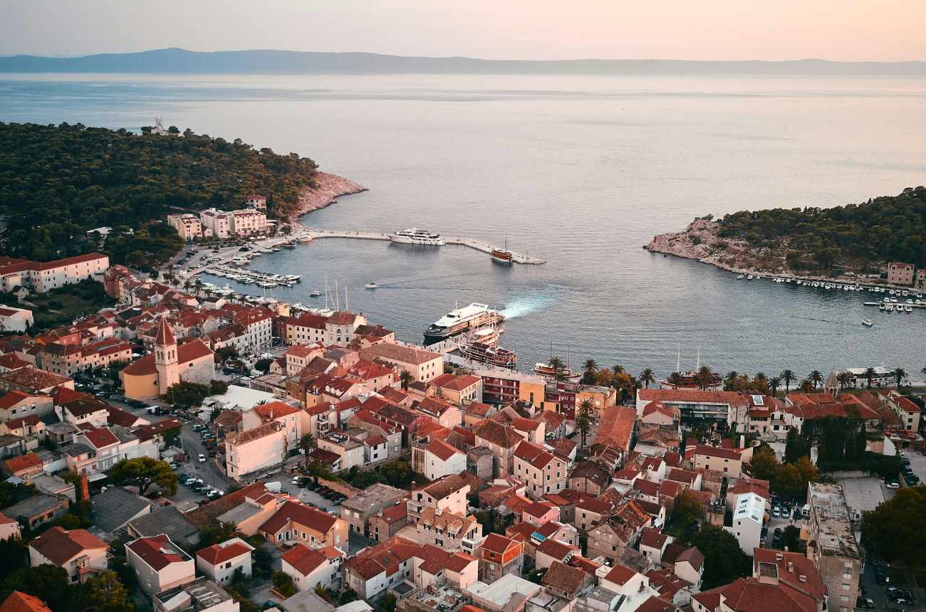 The {
  introHeadline: 'Are you ready for an unforgettable summer?',
  introText: 'Makarska, the gem of Croatia, awaits you with its crystal-clear sea, majestic Biokovo mountains, and a unique atmosphere where sports and fun come together perfectly!',
  introBridge: 'Why choose our camp?',
  trainingHeadline: 'Top-level training:',
  trainingText: 'Our camp takes place in a state-of-the-art sports hall designed for international events and elite training. Here, you’ll find:',
  trainingList: [
    'High-quality indoor courts for volleyball and other sports.',
    'Professional-grade flooring and equipment.',
    'A modern and inspiring environment to help you give your best!'
  ],
  improveHeadline: 'Improve every day with our Italian coaches:',
  improveText: 'Our camp’s goal is simple: to take your game to the next level! With the experience of our coaching staff, who work with some of the most prestigious volleyball teams in Italy, we will focus on:',
  improveList: [
    {
      improveListBold: 'Approach: ',
      improveListText: 'Helping you face every match with the right mindset.',
      _id: new ObjectId('67ae1bc9e16f16ae45655f99'),
      id: '67ae1bc9e16f16ae45655f99'
    },
    {
      improveListBold: 'Technique: ',
      improveListText: 'Perfecting every aspect of your game.',
      _id: new ObjectId('67ae1bc9e16f16ae45655f9a'),
      id: '67ae1bc9e16f16ae45655f9a'
    },
    {
      improveListBold: 'Physical conditioning: ',
      improveListText: 'Building strength, endurance, and agility.',
      _id: new ObjectId('67ae1bc9e16f16ae45655f9b'),
      id: '67ae1bc9e16f16ae45655f9b'
    },
    {
      improveListBold: 'Winning mentality: ',
      improveListText: 'Teaching you how to tackle challenges and come out on top!',
      _id: new ObjectId('67ae1bc9e16f16ae45655f9c'),
      id: '67ae1bc9e16f16ae45655f9c'
    }
  ],
  selling1Headline: 'Relax and have fun in a natural paradise:',
  selling1Text: 'When you’re not training, you can unwind on Makarska’s stunning beaches, dive into the crystal-clear sea, and explore one of the most beautiful towns in Dalmatia.',
  selling2Headline: 'Comfort guaranteed:',
  selling2Text: 'Meals and snacks are provided during the camp day. You’ll have everything you need to focus on training, with all necessary facilities at the sports complex for an exciting and active day!',
  selling3Headline: 'Don’t miss this opportunity!',
  selling3Text: 'Spaces are limited, and this chance to train with top coaches in a dream location is too good to pass up.',
  selling4Headline: 'Sign up now!!',
  selling4Text: 'And secure your spot in the camp that will help you grow as an athlete and create summer memories to last a lifetime!',
  descriptionCta: 'You focus on having fun; we’ll take care of the rest. See you in Makarska!'
} Camp 1